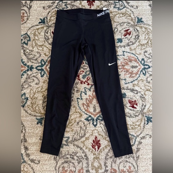 Nike Pants - Nike Pro Warm Training Tights for Women in Black